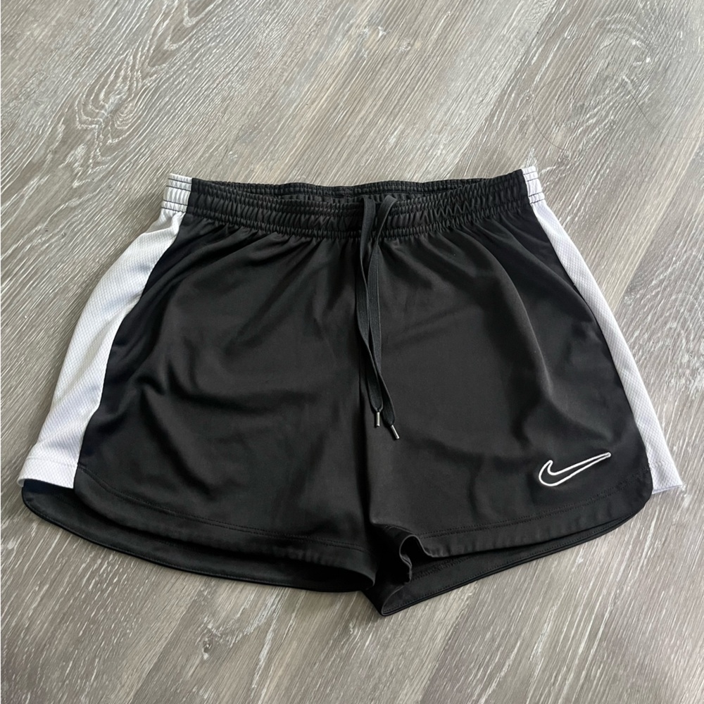 Nike Black Athletic Shorts with White Side Panels and Swoosh